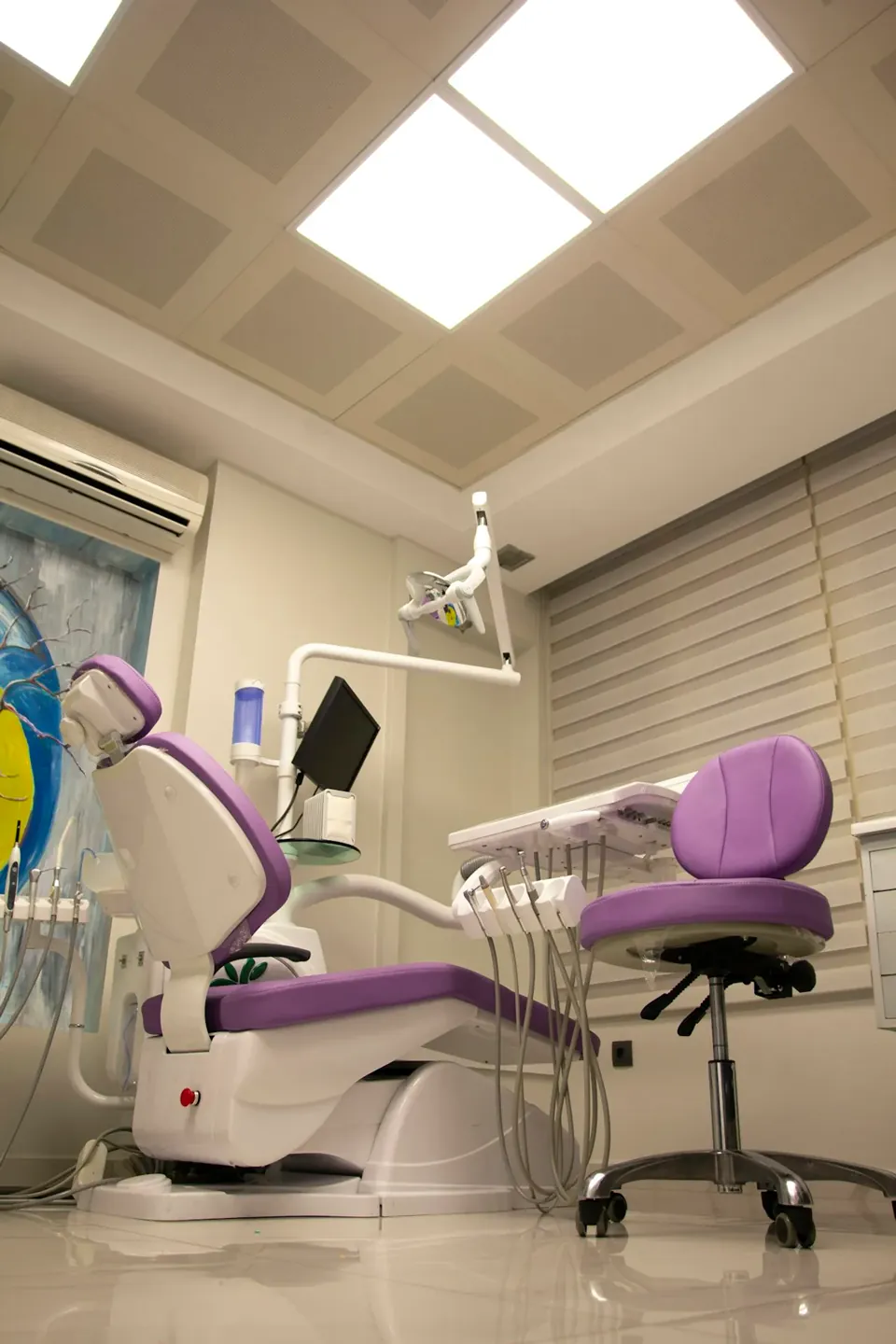 A bright, modern dental clinic treatment room bathed in natural light